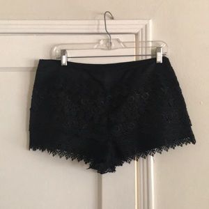 Black crochet layered mini shorts